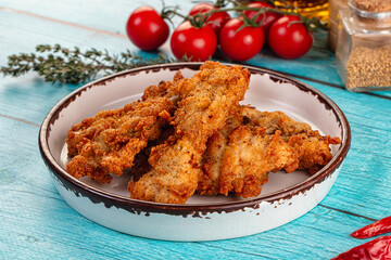 Golden crispy fried chicken strips