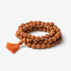 Obraz premium Traditional prayer beads rudraksha mala on white, suited for spiritual shop websites, yoga studio materials, and meditation product mockups