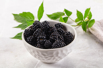 Raw sweet juicy blackberry in the bowl