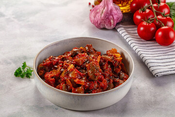 Roasted chicken hearts with vegetables