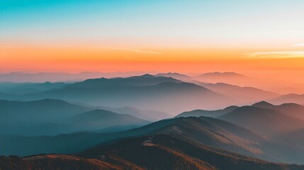 A mountain summit desktop wallpaper with a panoramic view of the horizon