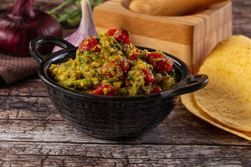 Green spicy Mexican guacamole dip