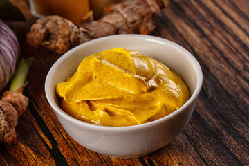 Indian yellow spicy curry sauce