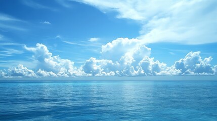 Obraz premium A tropical blue wallpaper with the ocean and sky meeting on the horizon