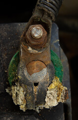 Car battery terminal with a large amount of sulfate, seen from above