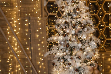 Decorated Christmas tree with shimmering lights and ornaments in a festive winter wonderland...