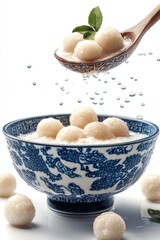 khanom bua loy flying with coconut milk and taro balls, isolated on white background