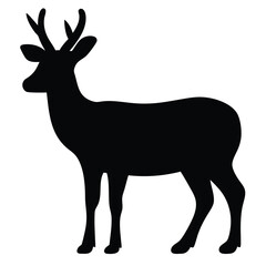 Black silhouette of a majestic reindeer stag with pronounced antlers standing alert