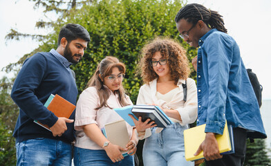 Diverse students studying together on university campus