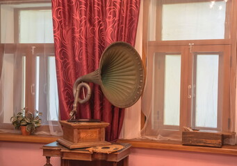 Antique gramophone with a copper tube