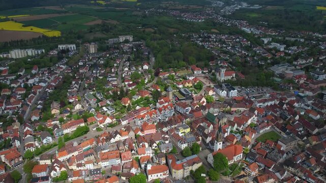 Aerial around the city bretten in Germany on a cloudy spring day.