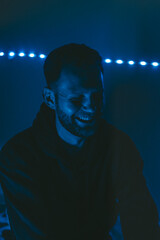 man portrait in moody cinematic rgb background 