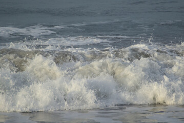 wave breaking on the rocks