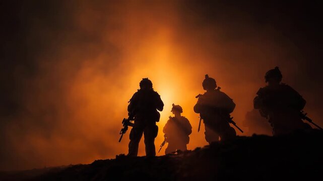 Silhouettes of armed soldiers walking through smoke with bright firelight behind military team in tense atmosphere concept of conflict danger and tactical operation at night