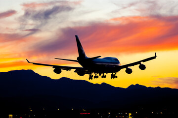 Sunset Landing: A Serene Flight Against a Vibrant Sky