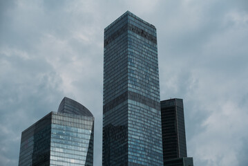 mirrored windows of the facade of an office building
