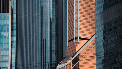 mirrored windows of the facade of an office building
