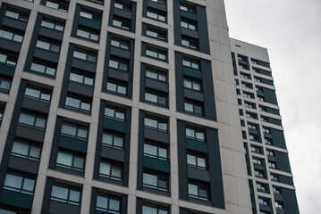 mirrored windows of the facade of an office building