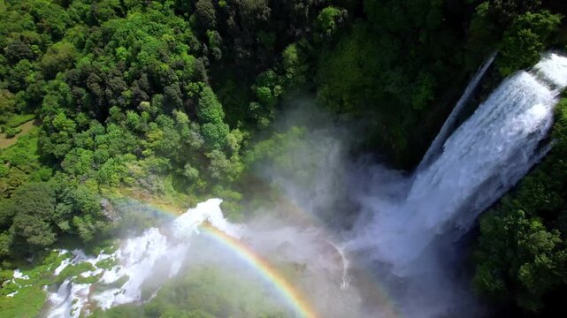 Aerial view of Cascata delle Marmore waterfall with rainbow in Umbria Italy 4K cinematic drone shot