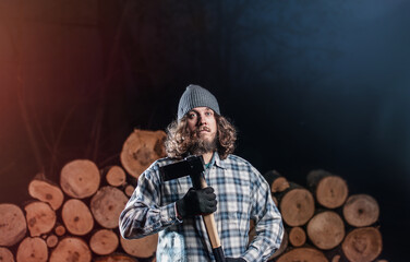 Rugged lumberjack with long hair chopping wood in forest, strength and wilderness vibe