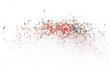 Colorful pencil tip flying, shavings from sharpener, isolated on white background and texture, clipping path	