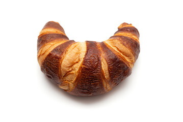 Classic French croissant isolated on a white background