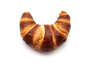 Classic French croissant isolated on a white background