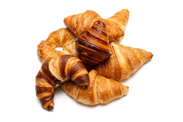 Assortment of various French croissants isolated on a white background
