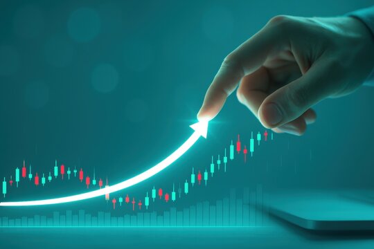 Hand pointing at glowing upward chart with bar graph for financial growth and investment success 

