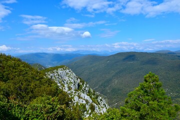 Rocky slopes from Sabotin hill above a valley in Primorska, Slovenia