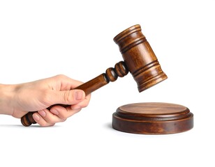 A hand holds a wooden gavel poised above a circular wooden block, isolated against a plain white background.