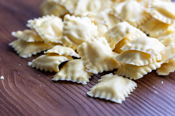 Raw Italian Ravioli Pasta on a Wooden Table