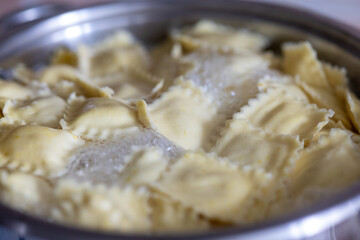 Italian Ravioli Pasta Cooking in a Metal Pot