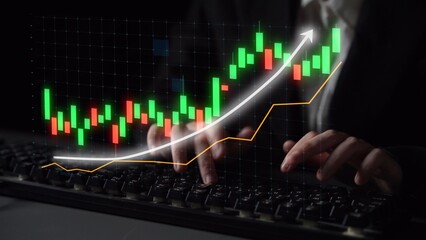 A focused business professional analyzes stock market trends on their computer, showcasing digital graphs and candlestick patterns that indicate growth and investment opportunities. Copula