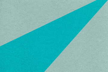 Fototapeta premium Abstract old geometric cool gray paper background with turquoise rays, macro texture for banner, template, presentation