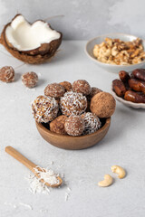 Homemade vegan healthy sugar-free candies made from dried fruits and nuts. Healthy eating.
