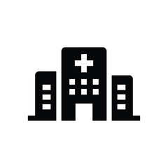 Modern hospital building with a prominent cross symbol on the facade, representing healthcare and medical services in an urban setting