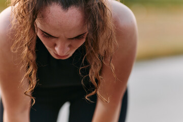 Woman Resting After Intense Run