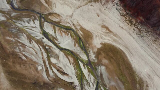 Aerial View of Mavrovo Dry Lake Bed: Unique Textures and Patterns Formed by Nature in Macedonia