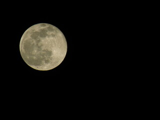 full moon over black