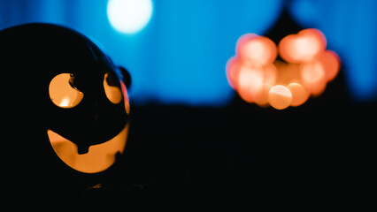 Little scary monster with copy space on the right for Halloween background