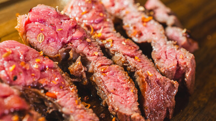 Close-up of a perfectly cooked medium rare steak, freshly sliced. Juicy and tender inside with a flavorful, seared crust. Appetizing and succulent, ideal for food lovers.