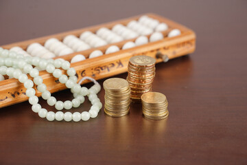 wooden abacus and beads on a close up shot