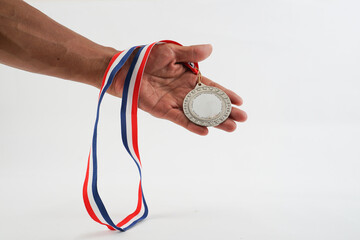 man holding a medal