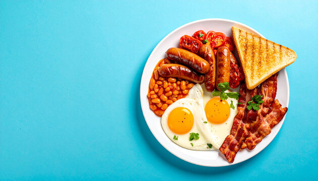 Full English breakfast with fried eggs and sausages