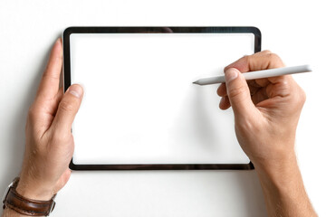 Overhead view of a person's hands holding a modern digital tablet with a blank white screen and a stylus pen.
