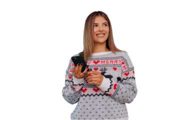 Young woman wearing christmas sweater and holding smartphone, celebrating holidays during winter, transparent background