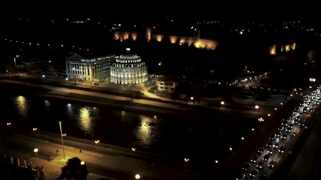 Night Traffic in Skopje: An Aerial View of Rush Hour along the Vardar River by the Goce Delcev Bridge in North Macedonia