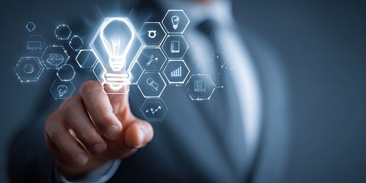 A hand interacting with a holographic lightbulb and interconnected data points