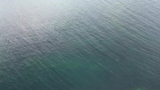 Stunning Aerial Drone Footage of the Aberdour Coastline in Scotland, Scenic Seaside Landscape with Rocky Cliffs, Blue Ocean Waves and Picturesque Coastal Views, Travel and Nature Background Video